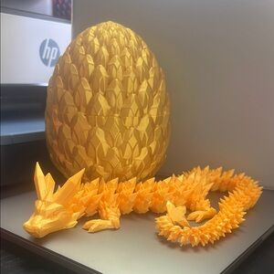 Orange Dragon, Egg Sculpture and more!